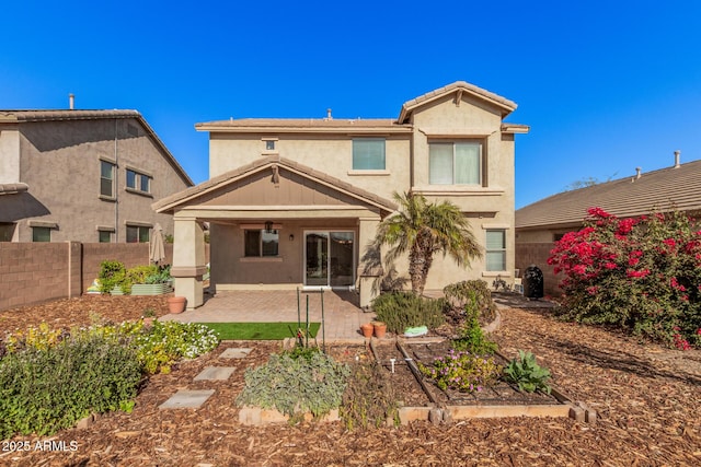 rear view of property with a patio