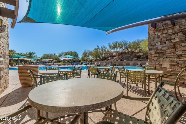 view of patio / terrace with a community pool