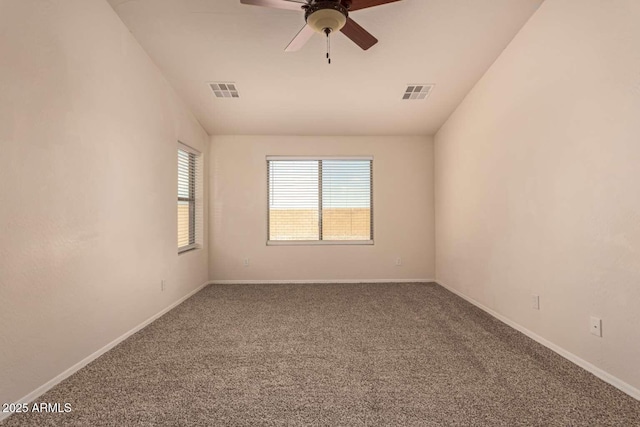 unfurnished room featuring carpet floors and ceiling fan