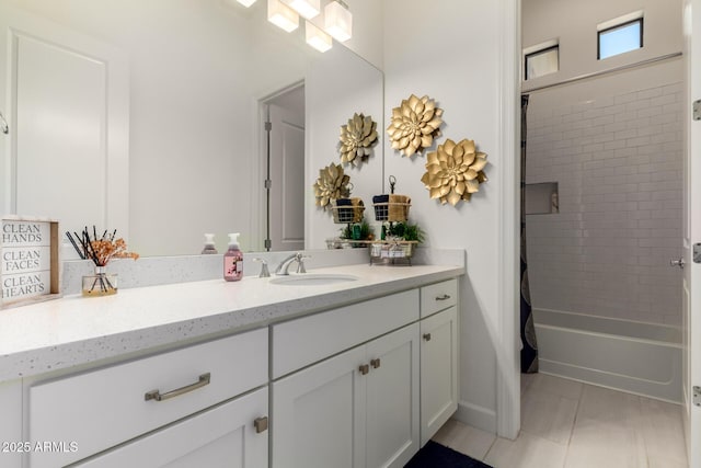 7002 S Portland Ave, Gilbert, AZ 85298 - full bathroom with vanity, washtub / shower combination, and tile patterned floors