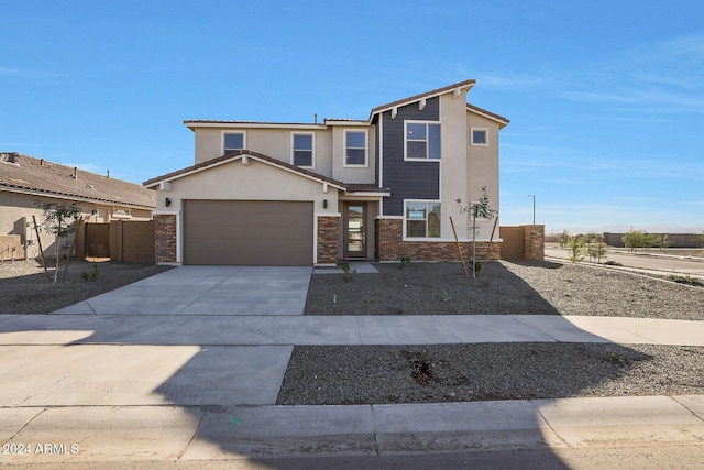 view of front of home with a garage