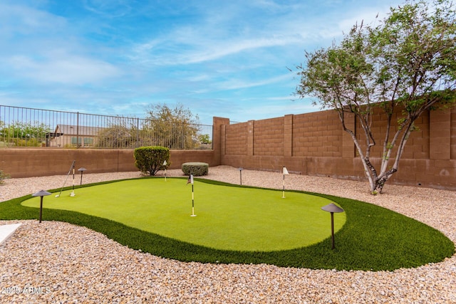 view of community featuring a fenced backyard