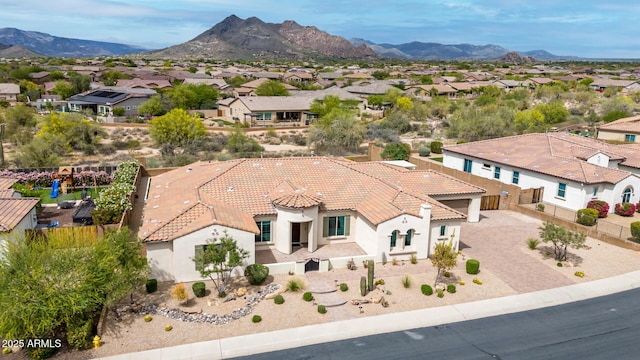 aerial view with a mountain view and a residential view