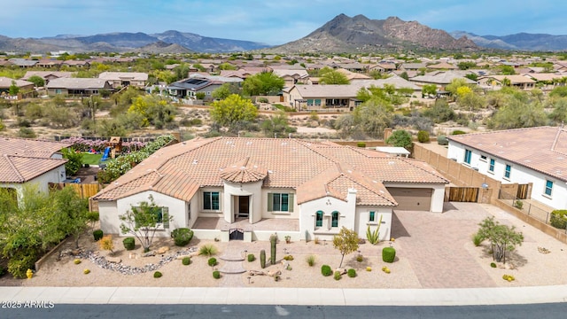 birds eye view of property featuring a residential view and a mountain view