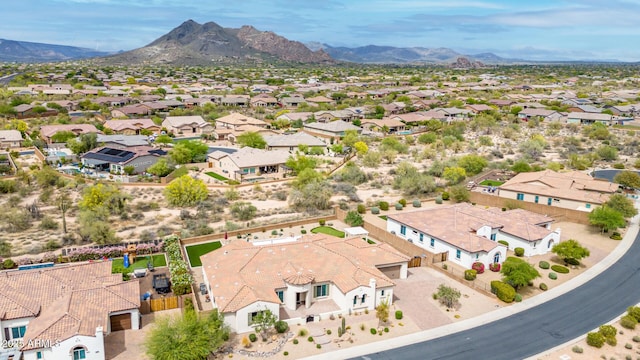 drone / aerial view with a residential view and a mountain view