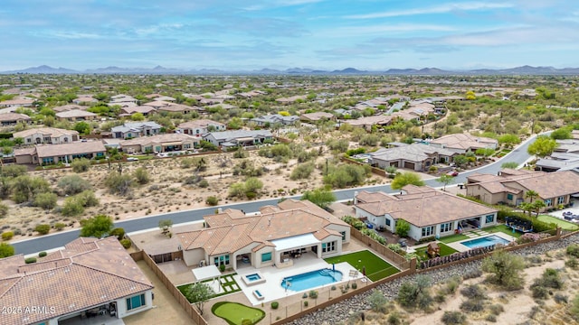 aerial view with a residential view and a mountain view