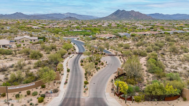 drone / aerial view featuring a mountain view and a residential view