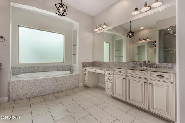 full bath featuring a bath and vanity