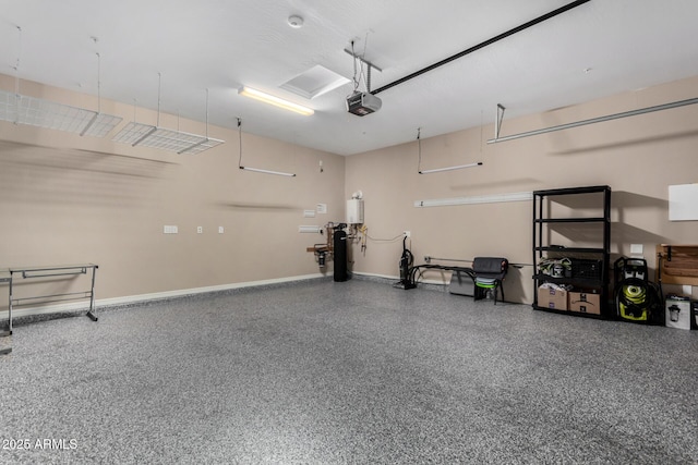 garage featuring a garage door opener and baseboards