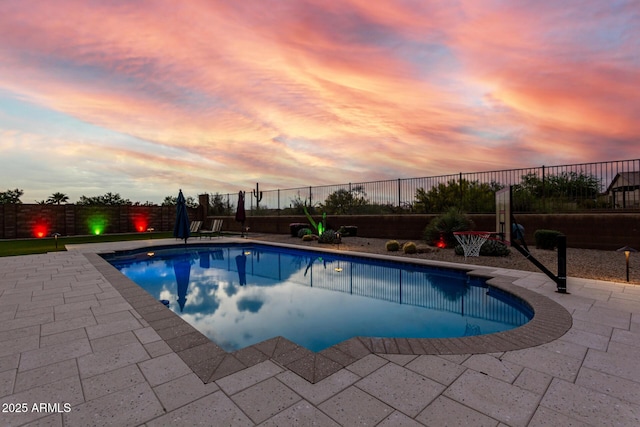 view of pool featuring a fenced in pool, a patio, and a fenced backyard