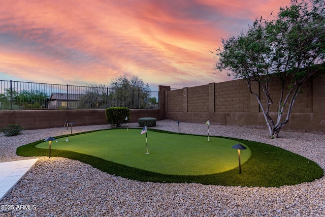 view of property's community with a fenced backyard