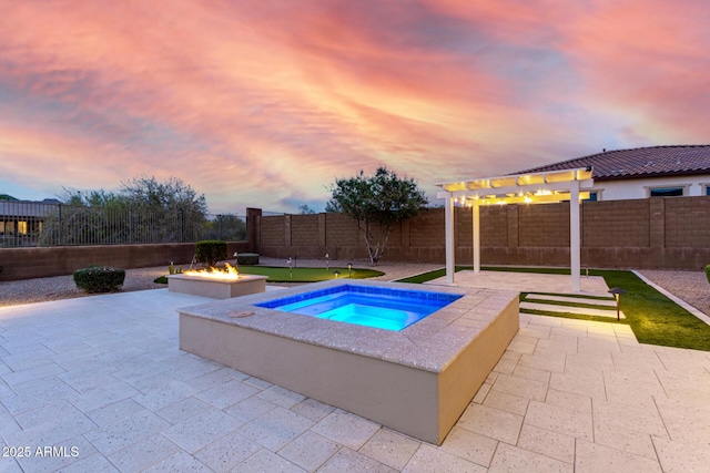 view of pool with a fire pit, a patio area, a fenced backyard, and an in ground hot tub
