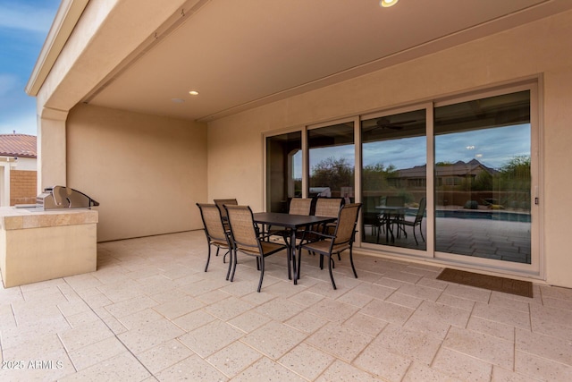 view of patio featuring outdoor dining space and area for grilling