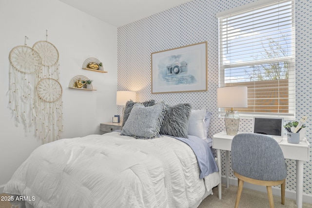 carpeted bedroom featuring wallpapered walls