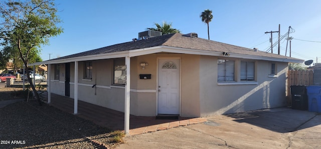 view of front of property with central air condition unit