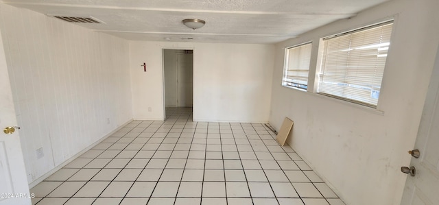 view of tiled spare room