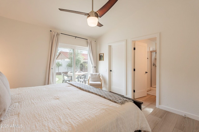 bedroom with light wood-style flooring, access to exterior, lofted ceiling, baseboards, and ensuite bathroom