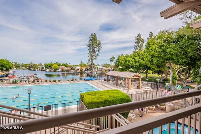 community pool featuring a water view
