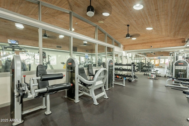 gym with lofted ceiling, wooden ceiling, and recessed lighting