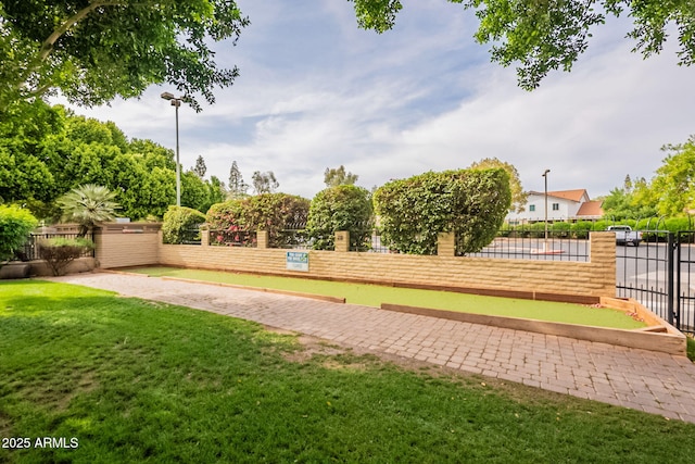 view of yard with a bocce ball area