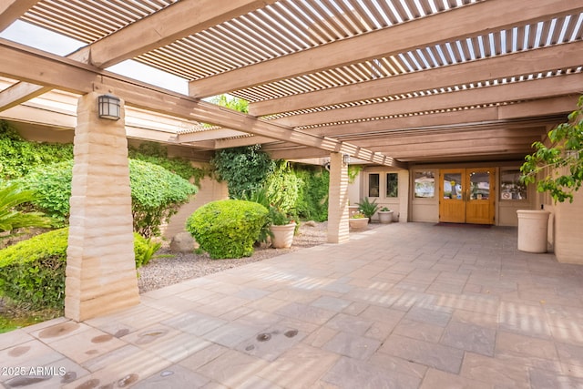 view of patio / terrace featuring a pergola and french doors