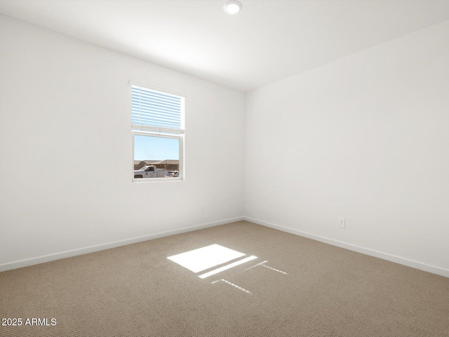 16081 W Remuda Dr, Surprise, AZ 85387 - carpeted empty room with baseboards