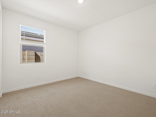 16081 W Remuda Dr, Surprise, AZ 85387 - carpeted empty room featuring baseboards and recessed lighting