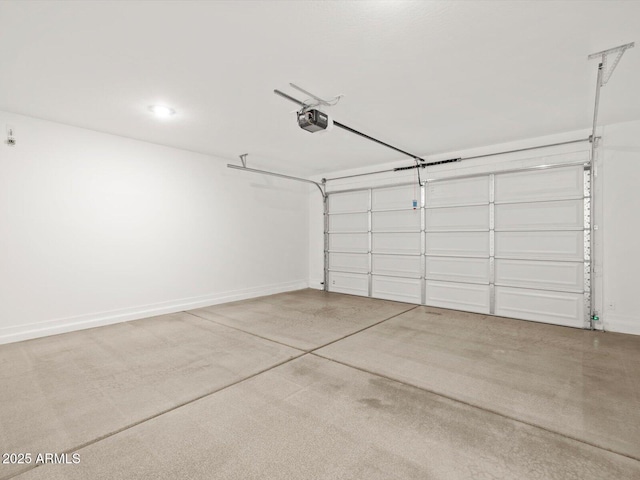 16081 W Remuda Dr, Surprise, AZ 85387 - garage with baseboards and a garage door opener