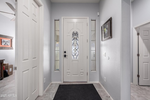 entrance foyer featuring baseboards