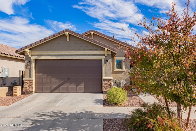 view of front of property featuring a garage