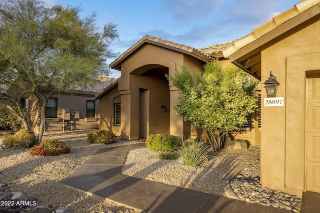 28897 N 94th Pl, Scottsdale, AZ 85262 - doorway to property with a tiled roof and stucco siding