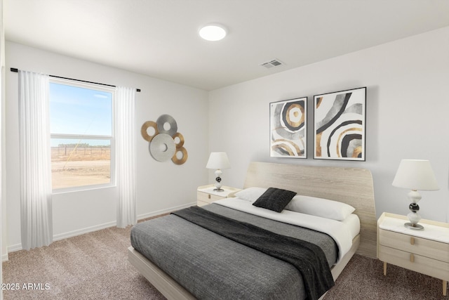 5055 N Jayson Rd, Casa Grande, AZ 85194 - carpeted bedroom featuring baseboards