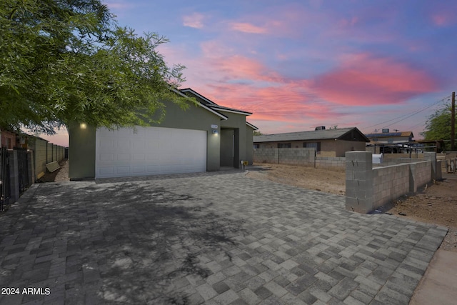 view of front of property featuring a garage