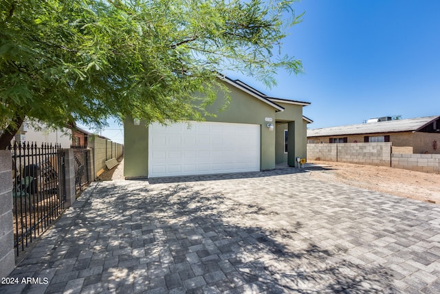 view of front of house with a garage