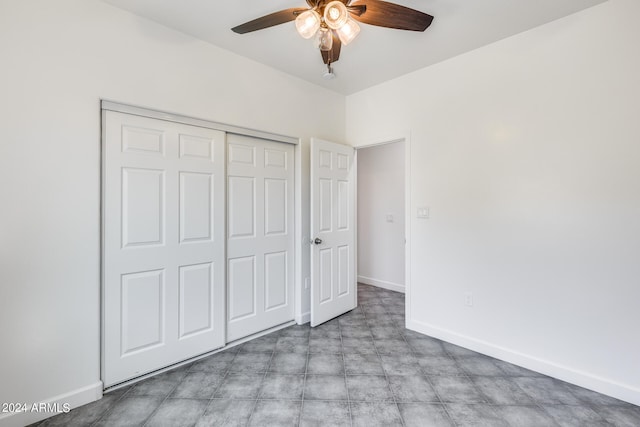 unfurnished bedroom with a closet, ceiling fan, and light tile patterned floors