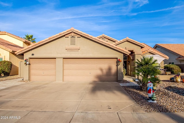 view of front of property with a garage