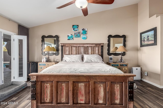 bedroom with access to exterior, ceiling fan, dark hardwood / wood-style flooring, and vaulted ceiling