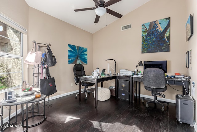 home office with ceiling fan, dark hardwood / wood-style flooring, and vaulted ceiling