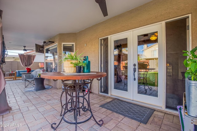 view of patio / terrace featuring french doors and ceiling fan