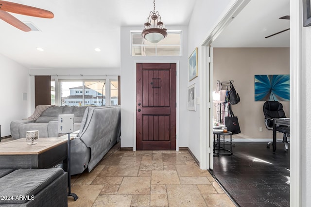 foyer with ceiling fan