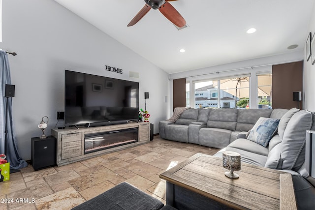 living room featuring high vaulted ceiling and ceiling fan