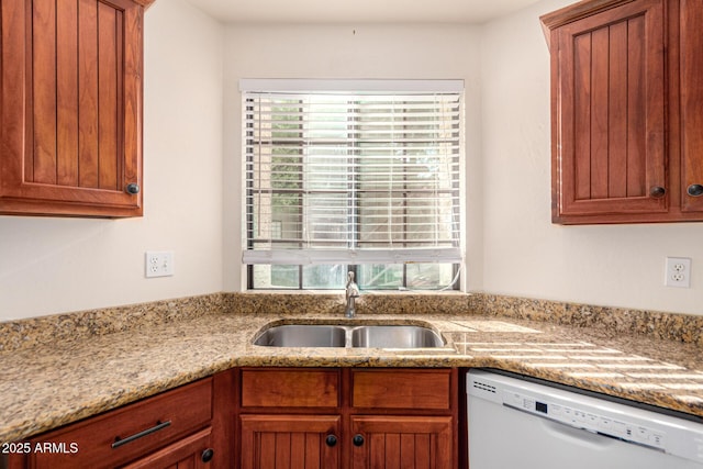 930 N Mesa Dr Unit 1023, Mesa, AZ 85201 - kitchen featuring white dishwasher, brown cabinetry, and light stone countertops