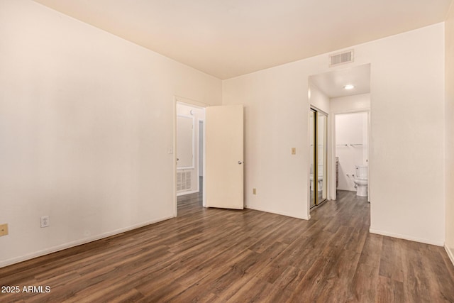 930 N Mesa Dr Unit 1023, Mesa, AZ 85201 - unfurnished room featuring dark wood-style flooring and baseboards