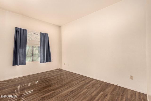 930 N Mesa Dr Unit 1023, Mesa, AZ 85201 - unfurnished room featuring dark wood-style flooring and baseboards