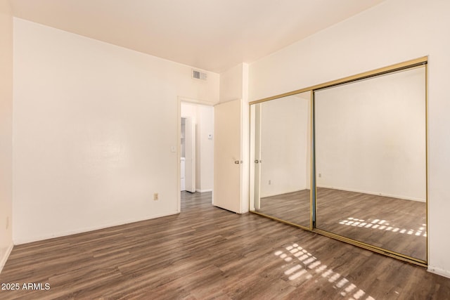 930 N Mesa Dr Unit 1023, Mesa, AZ 85201 - unfurnished bedroom with wood finished floors and a closet