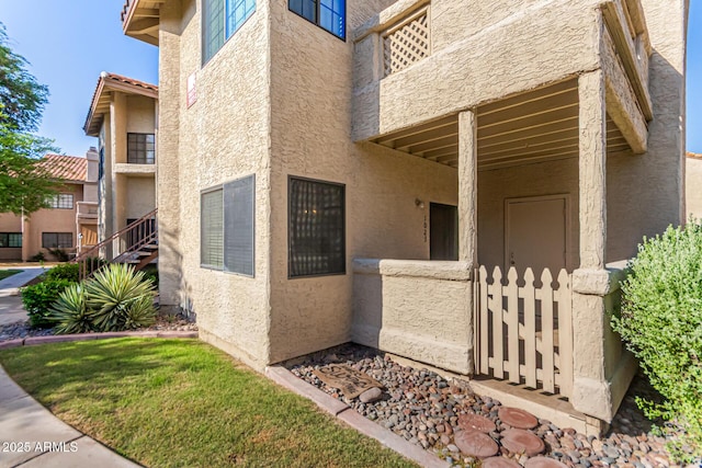930 N Mesa Dr Unit 1023, Mesa, AZ 85201 - property entrance featuring stucco siding