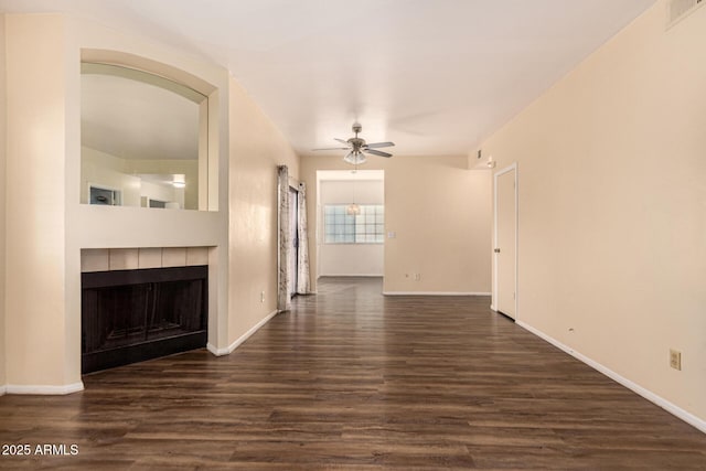 930 N Mesa Dr Unit 1023, Mesa, AZ 85201 - unfurnished living room featuring ceiling fan, dark wood-style flooring, and a tile fireplace