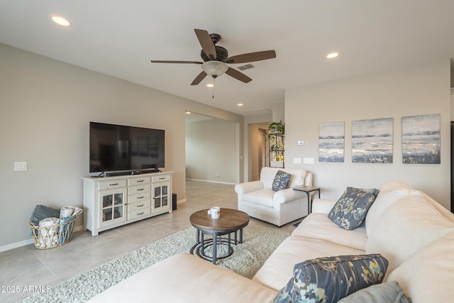 living room featuring recessed lighting, visible vents, baseboards, and light tile patterned flooring