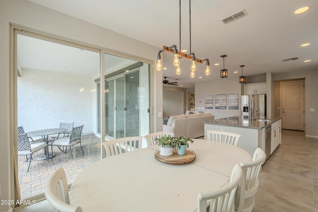 dining area with visible vents, recessed lighting, and a ceiling fan