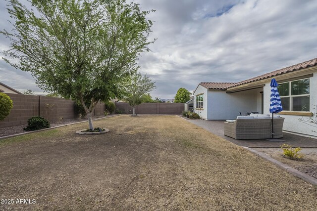 view of yard with a patio and a fenced backyard